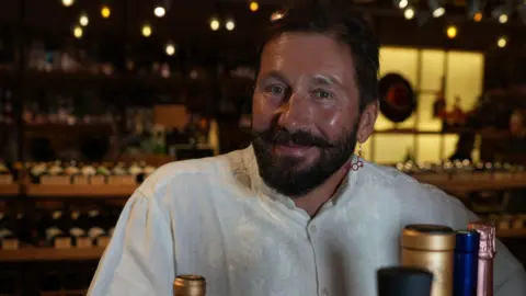 Evgeny Chichvarkin, the target of a potential kidnapping plot, pictured in his wine shop.