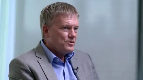 Richard Horne, CEO, National Cyber Security Centre, says companies need to step-up and improve their cybersecurity