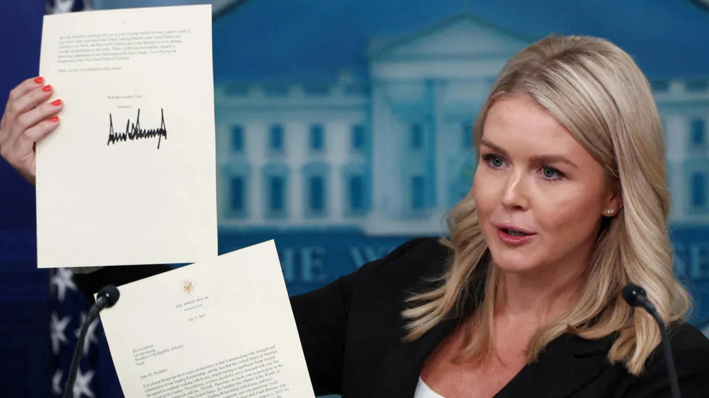 Reuters White House Press Secretary Karoline Leavitt shows a signed letter on tariffs from US President Donald Trump