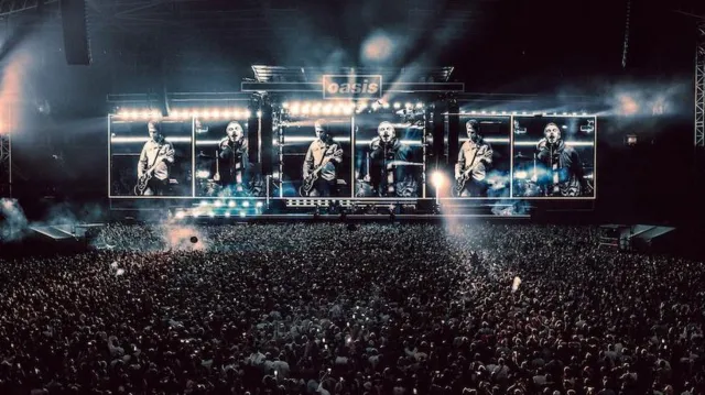 Oasis on stage in Cardiff
