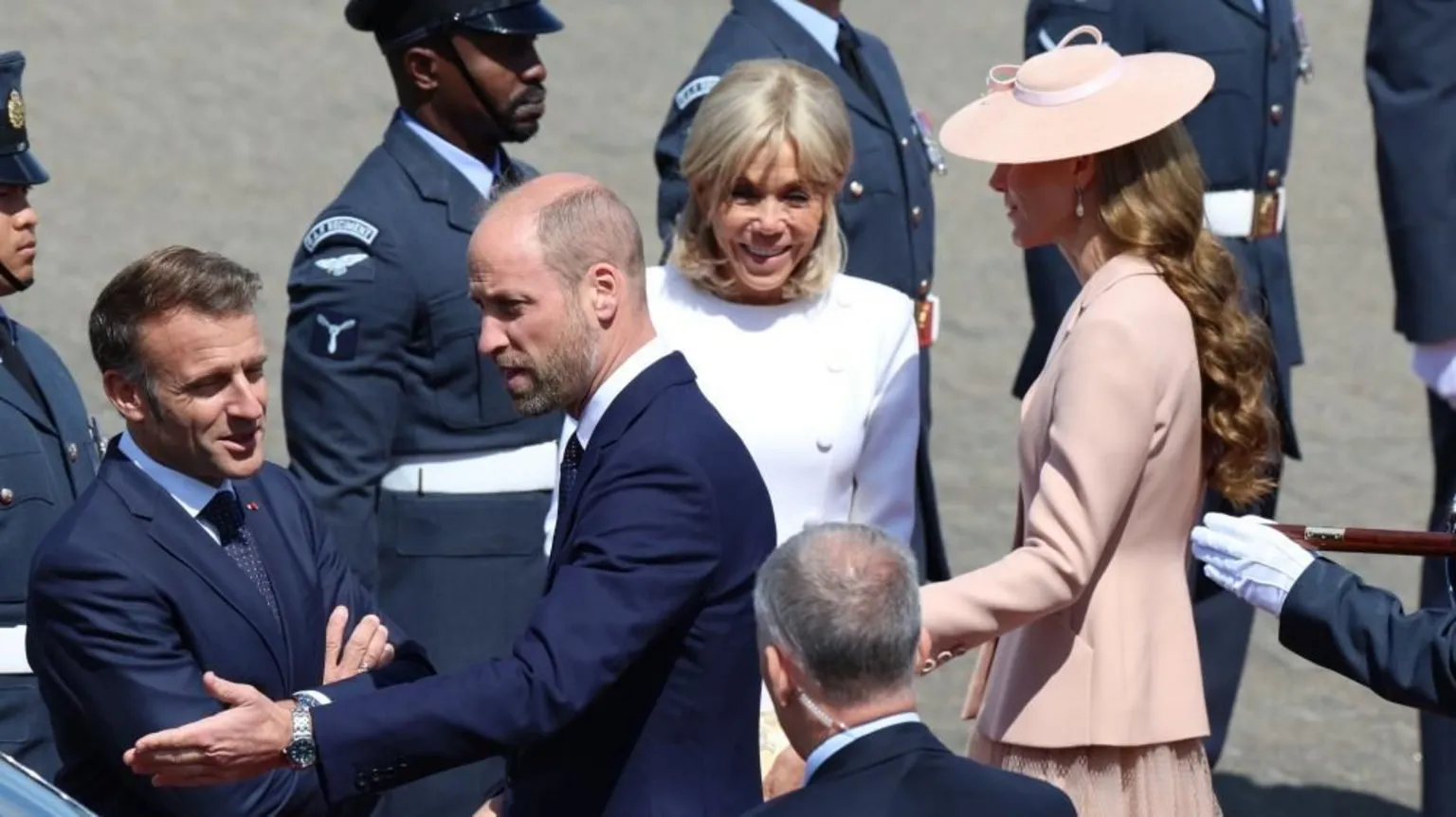PA Media French President Emmanuel Macron and his wife Brigitte are welcomed by the Prince and Princess of Wales.