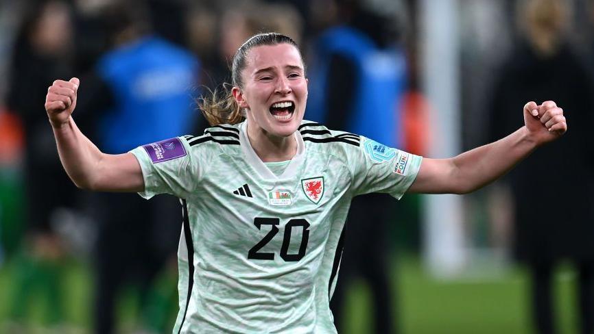 Carrie Jones celebrating a goal for Wales