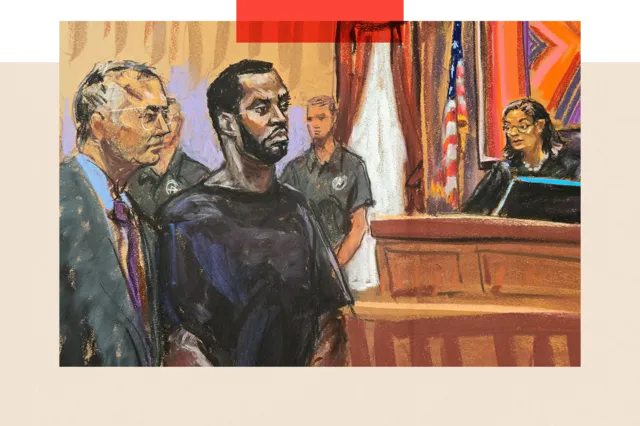 Reuters Sean "Diddy" Combs in a suit and sunglasses, with a cigar in his mouth
