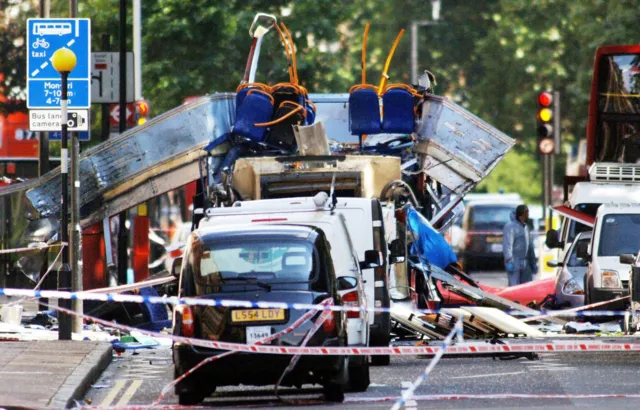 A damaged bus on a street in London after the 7/7 bombings.