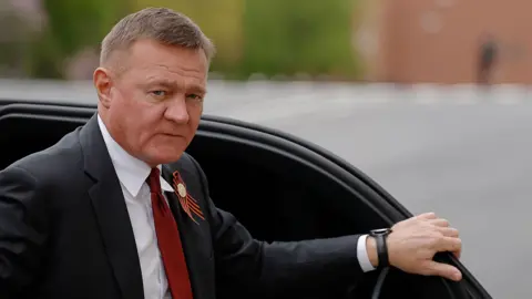 Roman Starovoit arriving at a meeting in Moscow.