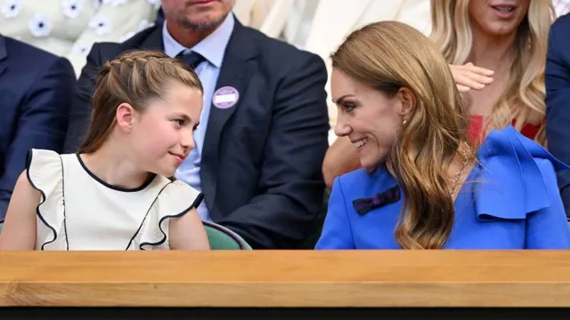 Princess Charlotte and the Princess of Wales sit front row in the royal box at Wimbledon.