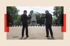 alt=Getty Images Boris Johnson and Emmanuel Macron point at each other on 18 June 2020 in London, England.