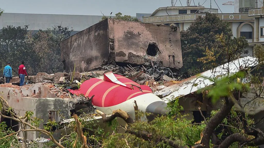 Air India Boeing 787 crash site investigators.