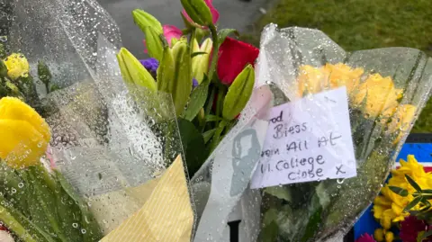 Flowers left at the scene of Chris Marriott’s death