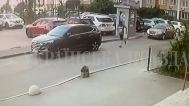 The unidentified assailant can be seen running towards the victim before shooting him several times
