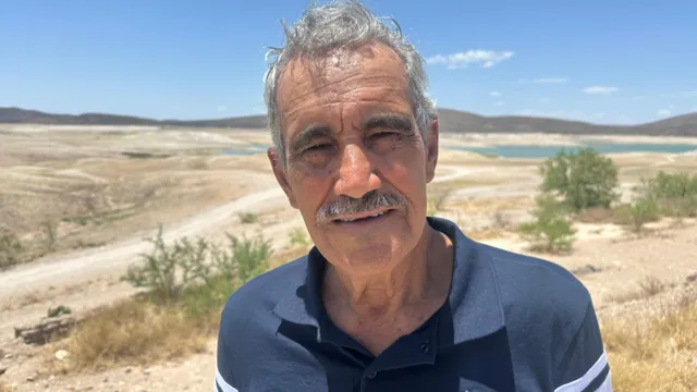 Rafael Betance says that water levels in the reservoir have fallen for the past eight years
