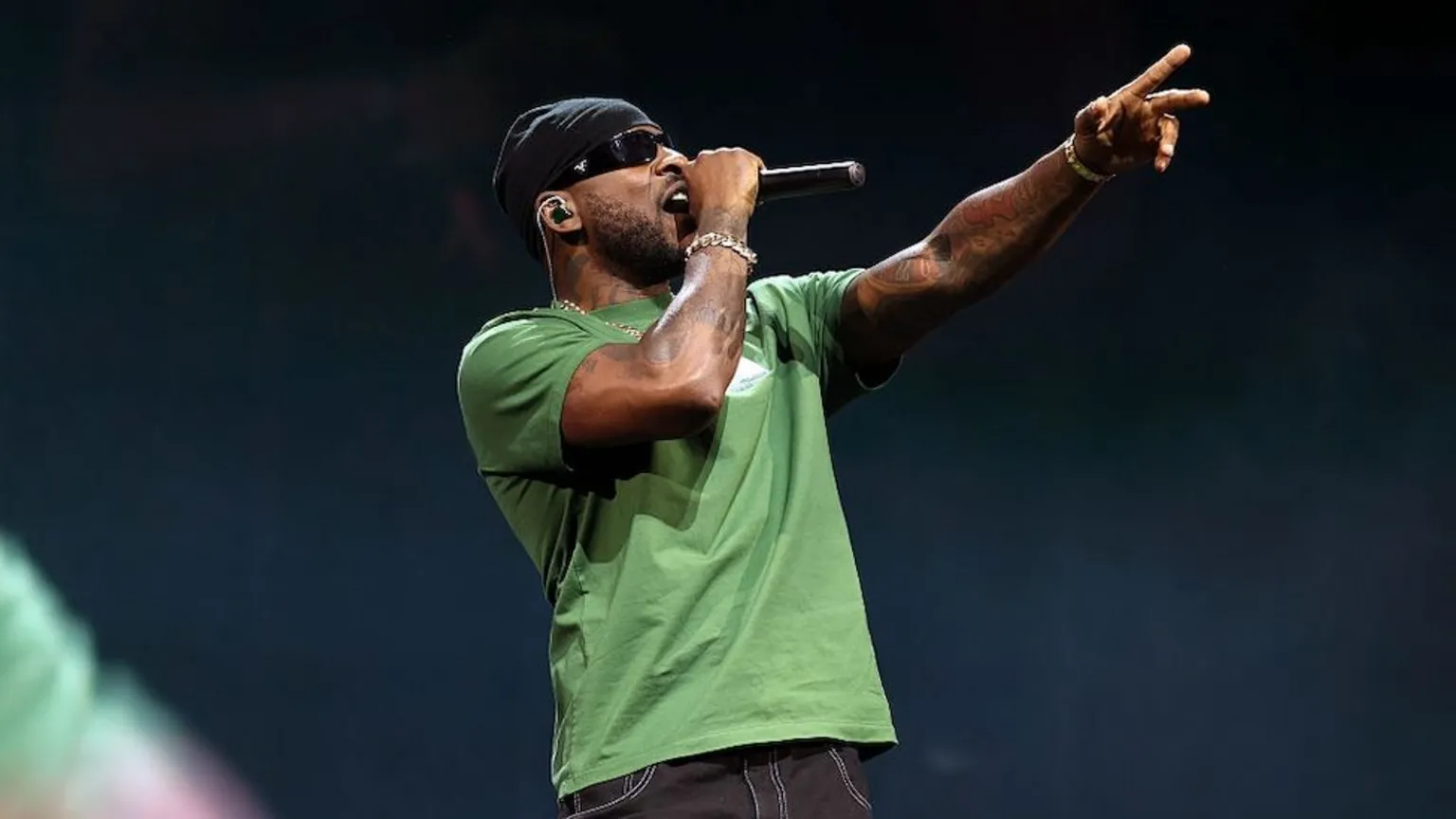 Getty Images Mario performs in a black leather outfit