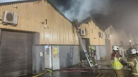 Damage caused by a fire at an industrial unit in Leyton
