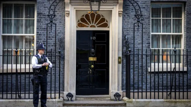 Getty Images Police officer stands outside 10 Downing Street